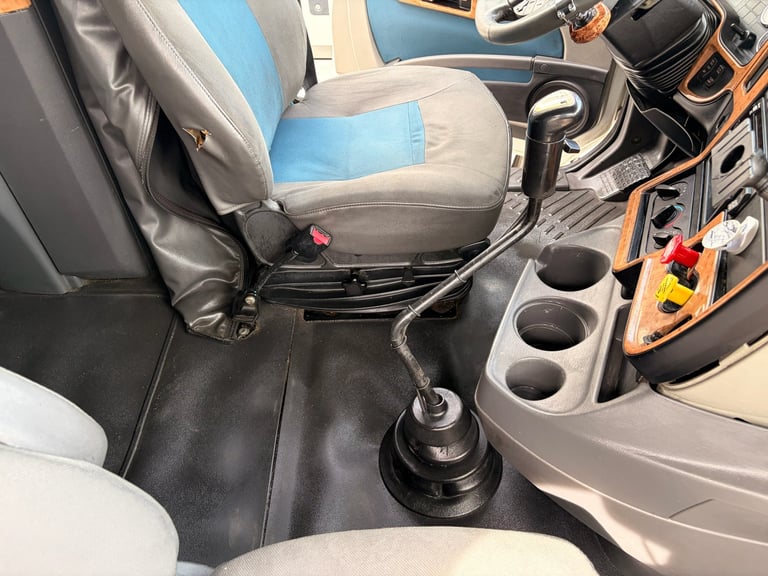 Clean car interior with blue and gray seats